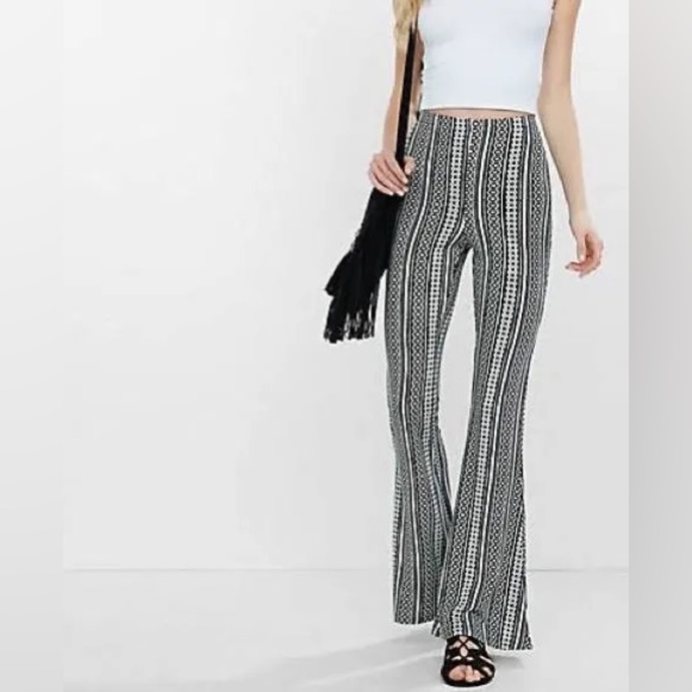 Express black and white patterned flared leggings